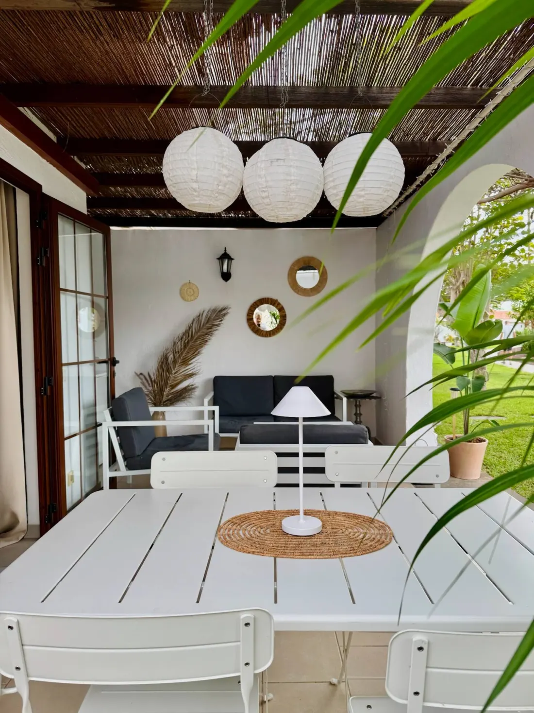 The sunroom, doors open to the garden